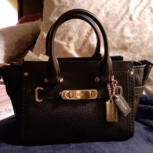 Petite black COACH purse
